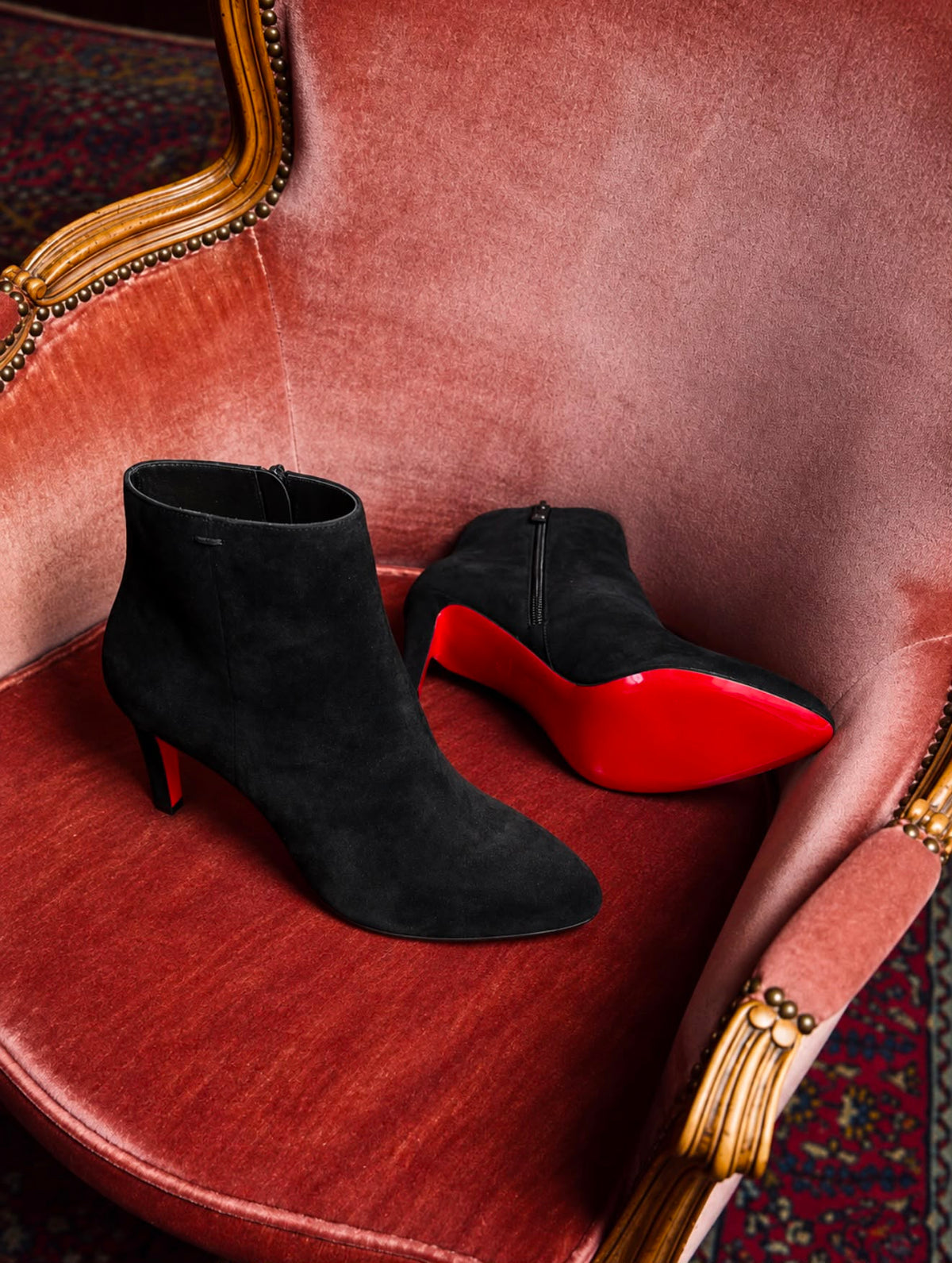 Christian Louboutin black suede booties at Kymyka Maastricht